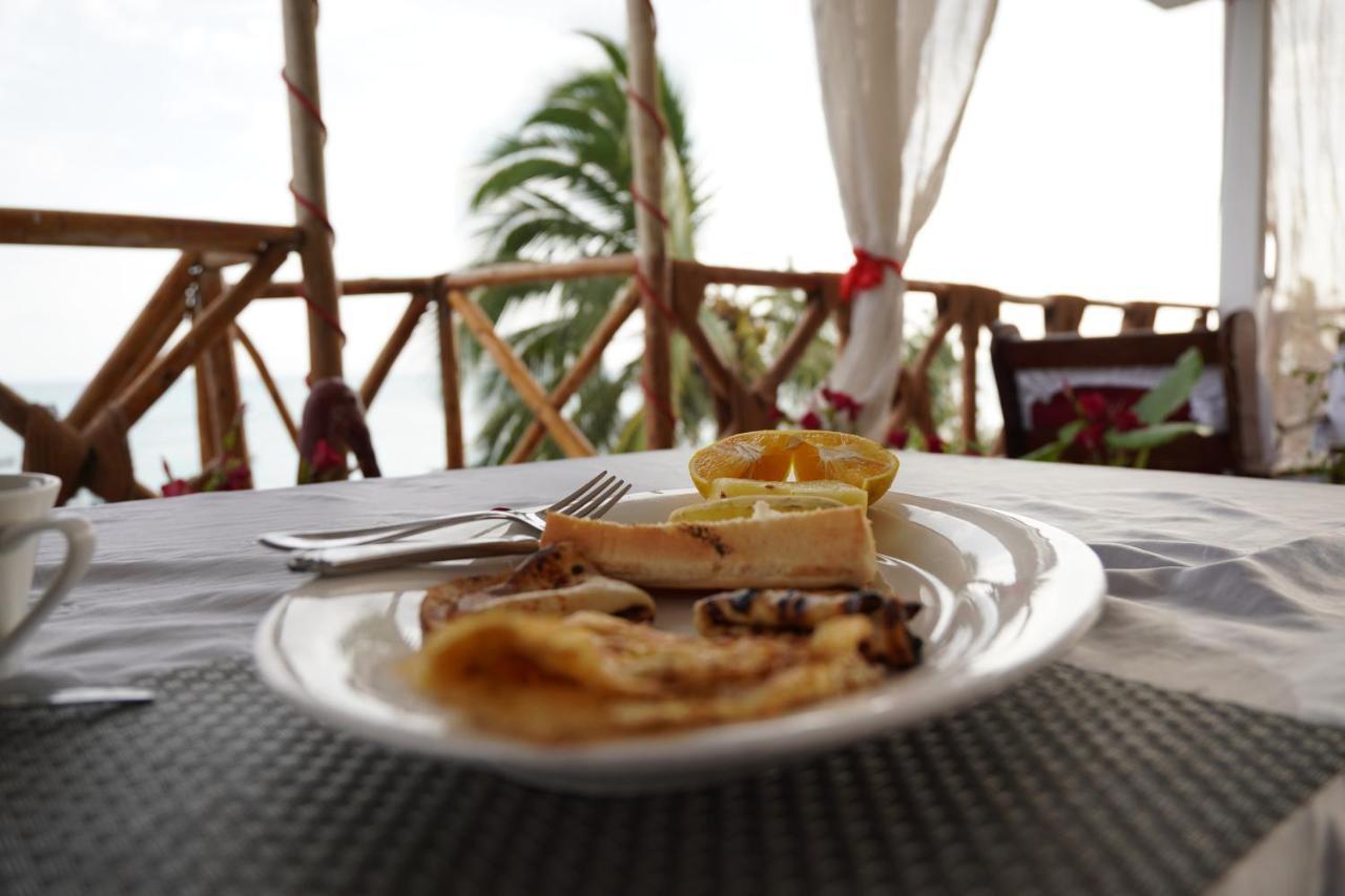 Zaina'S Beach House นูงวี ภายนอก รูปภาพ